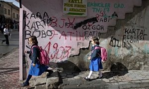 Turkish women walk house from college.